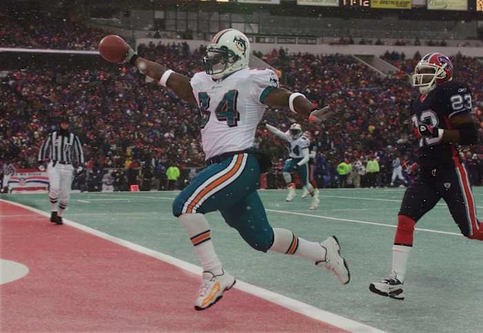 Miami Dolphins running back Ricky Williams scores a touchdown against the Buffalo Bills.